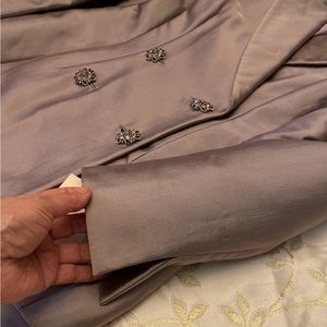 NWT. BADGLY @ MISCHKA LAVENDER skirt suit is in size 12.